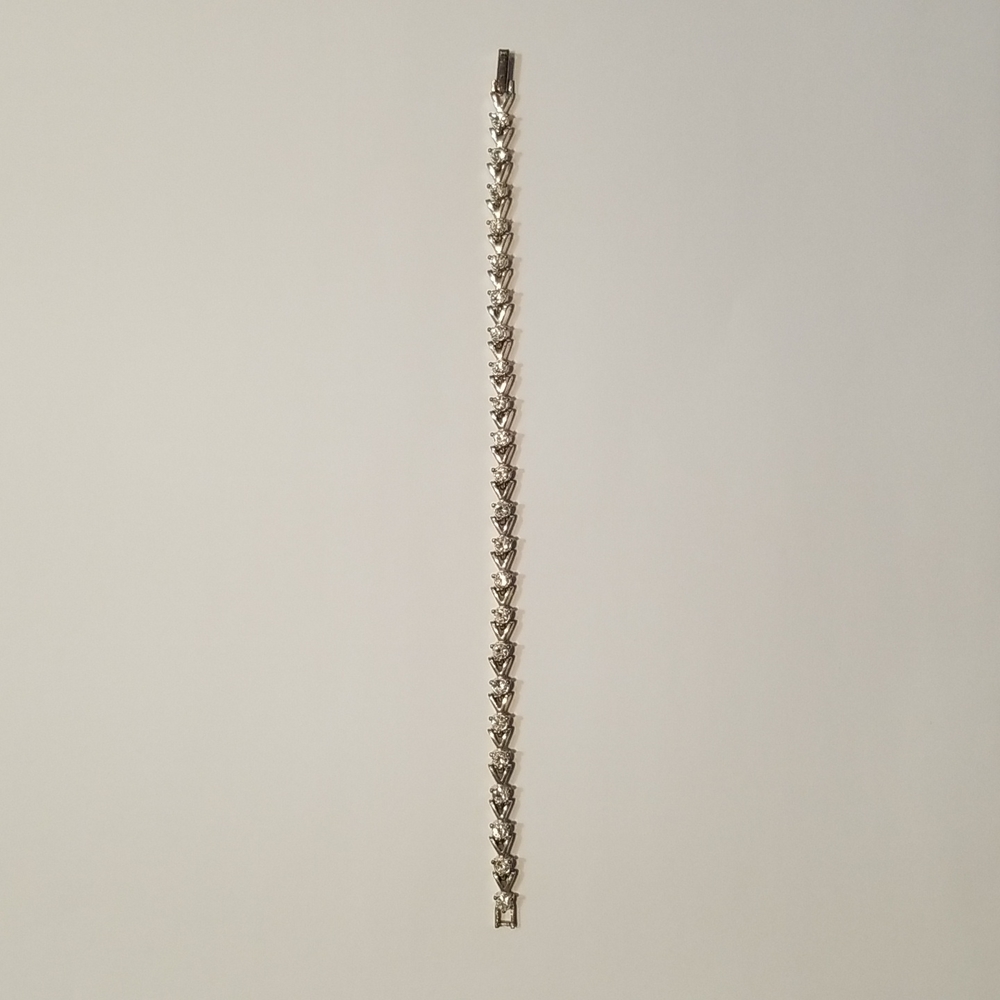 Avon sterling silver and cubic zirconia tennis Bracelet, 7" long, NWOT
